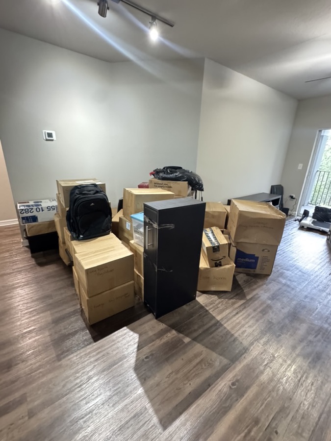 Stack of boxes in an empty apartment