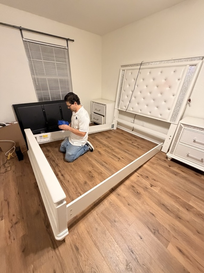 Toro mover assembling a bedframe
