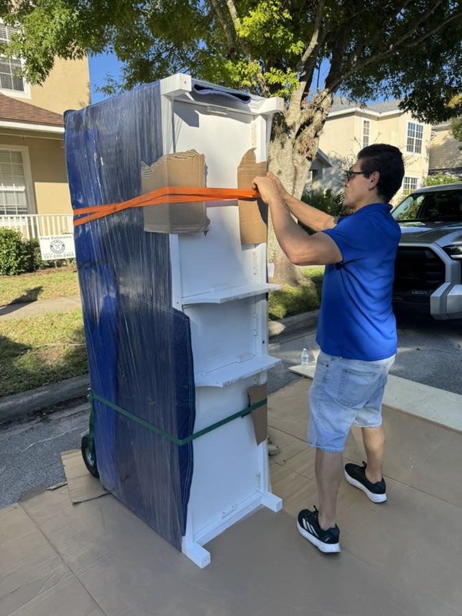 Toro mover wrapping a tall wardrobe